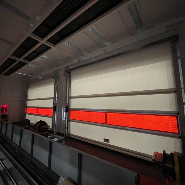 Porta rapida modello Volta ad arrotolamento 2023, con settore rosso